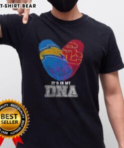 Alt Text: Awesome Fingerprints Los Angeles Chargers x USC Trojans 'It's In My DNA' T-shirt showcasing team spirit and style.
