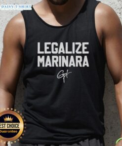 Awesome Guy Fieri wearing a 'Legalize Marinara' tank top, showcasing a fun food-themed fashion statement.