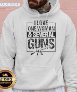Awesome vintage hoodie featuring 'I Love One Woman And Several Guns' design, perfect for gun enthusiasts and casual wear.