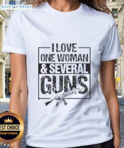 Awesome vintage ladies tee featuring 'I Love One Woman And Several Guns' graphic design.