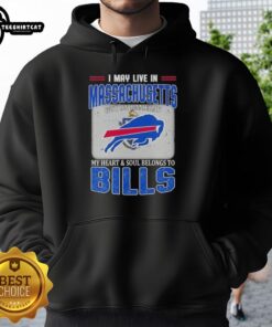 Alt Text: Fan wearing a Buffalo Bills hoodie, showcasing pride for the team while living in Massachusetts on game day.