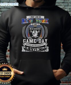 Alt Text: Fan wearing Las Vegas Raiders football hoodie, showcasing pride on game day despite living in New York.