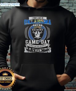 Oklahoma fan wearing Las Vegas Raiders football hoodie, showcasing team spirit on game day.