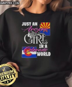 Alt Text: Arizona girl in a Colorado world sweatshirt, showcasing a stylish blend of state pride and cozy fashion.