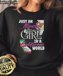 Alt Text: Illinois girl wearing 'Just An Illinois Girl In A California World' sweatshirt, showcasing Midwest pride in California style.