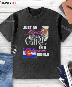 Alt Text: Awesome Illinois girl in Colorado world wearing a washed t-shirt, showcasing a blend of styles and locations.