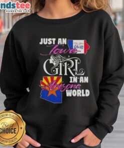 Iowa girl in an Arizona world sweatshirt, showcasing casual style and comfort in a vibrant outdoor setting.