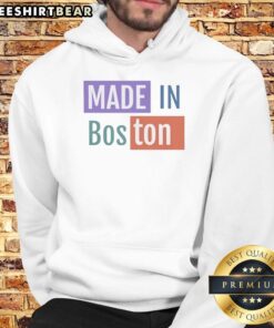 Stylish Awesome Made In Boston Hoodie displayed on a hanger, showcasing its unique design and vibrant colors.