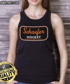 Awesome Matthew Schaefer in New York Islanders hockey tank top at The Long Island skating rink.