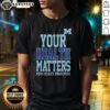 Alt Text: Awesome Michigan Wolverines 'Your Health Matters' T-Shirt featuring team colors and logo, perfect for fans and health advocates.