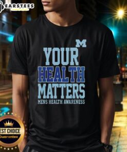 Alt Text: Awesome Michigan Wolverines 'Your Health Matters' T-Shirt featuring team colors and logo, perfect for fans and health advocates.