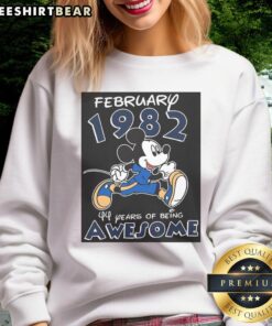 Alt Text: Awesome Mickey Mouse February 1982 sweatshirt celebrating 44 years of being awesome with vibrant design and colors.