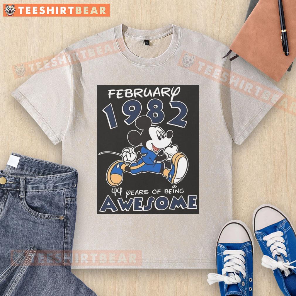 awesome-mickey-mouse-february-1982-44-years-of-being-awesome-washed-t-shirt Alt Text: Awesome Mickey Mouse February 1982 washed t-shirt celebrating 44 years of being awesome with a vintage design.