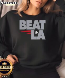 Awesome New England Patriots Beat La Sweatshirt featuring team colors and logo, perfect for fans showing their support.