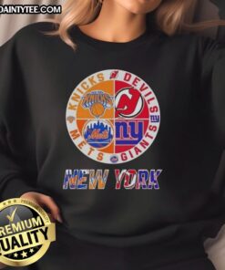 Awesome New York City sports sweatshirt featuring Knicks, Devils, Giants, and Mets logos in a stylish design.