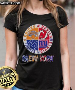Alt Text: Awesome New York City sports team logos for Knicks, Devils, Giants, and Yankees on a ladies' tee shirt.