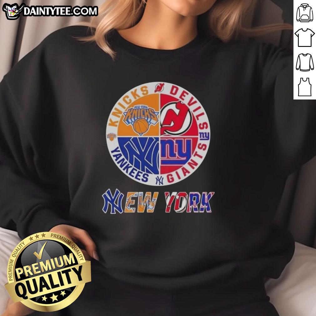 awesome-new-york-city-sports-knicks-devils-giants-yankees-logos-combine-sweatshirt Alt Text: Awesome New York City sports sweatshirt featuring Knicks, Devils, Giants, and Yankees logos in a stylish design.