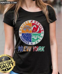 Awesome New York City sports logos for Knicks, Devils, Jets, and Yankees on a stylish ladies tee.
