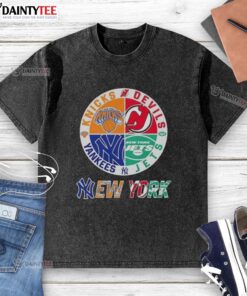 Alt Text: Awesome New York City Sports Knicks Devils Jets Yankees logos on a combine washed t-shirt, perfect for fans.