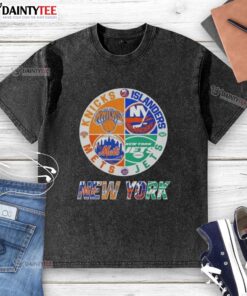 Awesome New York City sports logos on a washed t-shirt featuring Knicks, Islanders, Jets, and Mets designs.