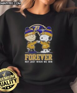 Awesome Peanut Snoopy and Charlie Brown Baltimore Ravens sweatshirt, perfect for fans celebrating every game.