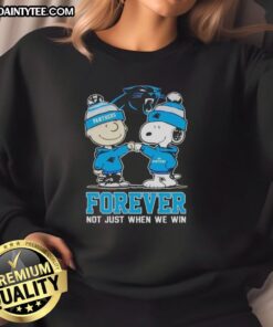 Alt Text: Awesome Peanut Snoopy and Charlie Brown Carolina Panthers sweatshirt for fans, celebrating loyalty beyond wins.