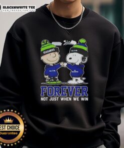 Alt Text: Awesome Peanut Snoopy and Charlie Brown sweatshirt for Seattle Seahawks fans, celebrating loyalty beyond wins.