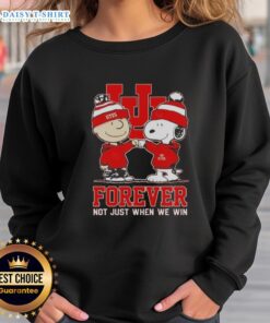 Alt Text: Awesome Peanut Snoopy and Charlie Brown sweatshirt for Utah Utes fans, featuring 'Forever Not Just When We Win' slogan.