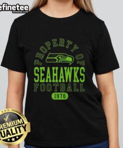 Seattle Seahawks ladies tee featuring awesome property design, celebrating football since 1976. Perfect fan apparel!