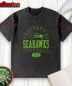 Alt Text: Awesome Seattle Seahawks football washed t-shirt, showcasing team pride since 1976, perfect for fans and casual wear.