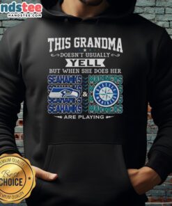 Grandma in a Seattle Seahawks hoodie cheering for the Seahawks and Mariners, showcasing her team spirit.