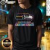 Alt Text: Awesome Seattle Seahawks Football T-Shirt featuring colors and logo, supporting cancer awareness and saying 'Cancer Sucks'.