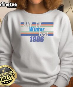 Awesome Shy TV Winterfest 1986 sweatshirt featuring vibrant graphics and cozy design for winter fashion enthusiasts.