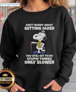 Alt Text: Awesome Snoopy sweatshirt with 'Don't worry about getting older, you're still get to do stupid things only slower' quote.