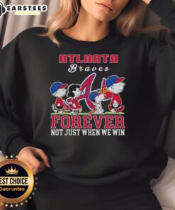Awesome Snoopy Peanuts Atlanta Braves sweatshirt featuring 'Forever, Not Just When We Win' design, perfect for fans.