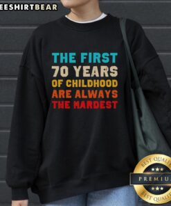 Vintage sweatshirt featuring the quote The First 70 Years of Childhood Are Always the Hardest in stylish font.