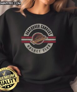 Vintage Vancouver Canucks sweatshirt featuring a stylish surround design, perfect for fans and collectors.