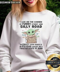 Cute Baby Yoda in a Psycho sweatshirt, standing on the corner of Funny Street and Silly Road in Crazy Town.
