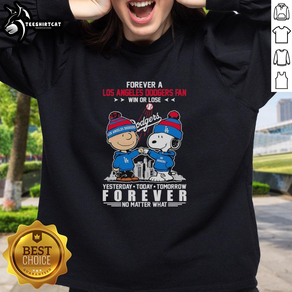 cute-charlie-brown-fist-bump-snoopy-forever-a-los-angeles-dodgers-fan-win-or-lose-no-matter-what-sweatshirt Alt Text: Cute Charlie Brown fist bump with Snoopy on a 'Forever a Los Angeles Dodgers Fan' sweatshirt, win or lose.