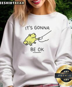 Cute frog graphic on 'It's Gonna Be OK' sweatshirt, perfect for casual outfits and frog lovers.