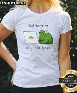 Cute frog in a playful pose wearing a tee, showcasing the 'Just Doing My Silly Little Tasks' design for ladies.