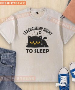 Cute cat on a washed t-shirt with 'I Exercise My Right to Sleep' design, perfect for cat lovers and comfy fashion.