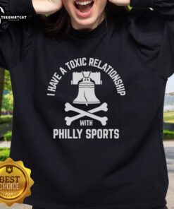Alt Text: Cute I Have A Toxic Relationship With Philly Sport Football Sweatshirt featuring a playful design and vibrant colors.