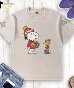 Alt Text: Cute Kansas City Chiefs Snoopy Woodstock football NFL washed t-shirt featuring vibrant graphics and a relaxed fit.