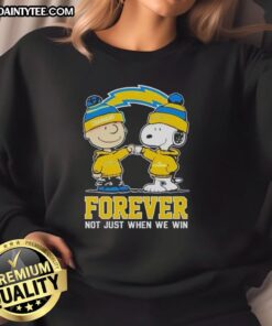 Alt Text: Cute Peanut Snoopy and Charlie Brown on Los Angeles Chargers sweatshirt, celebrating fandom beyond just wins.