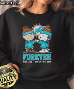 Alt Text: Cute Peanut Snoopy and Charlie Brown Miami Dolphins sweatshirt, perfect for fans who love the team all season long.