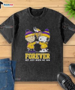 Cute Snoopy and Charlie Brown on a Minnesota Vikings 'Forever Not Just When We Win' washed t-shirt design.