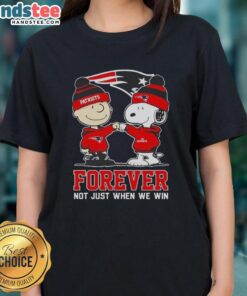 Alt Text: Cute Peanut Snoopy and Charlie Brown on a New England Patriots Forever tee for ladies, celebrating loyal fandom.