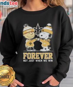 Cute Peanut Snoopy and Charlie Brown sweatshirt for New Orleans Saints fans, celebrating loyalty beyond wins.