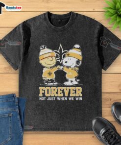 Cute Peanut Snoopy and Charlie Brown on a New Orleans Saints 'Forever Not Just When We Win' washed t-shirt.